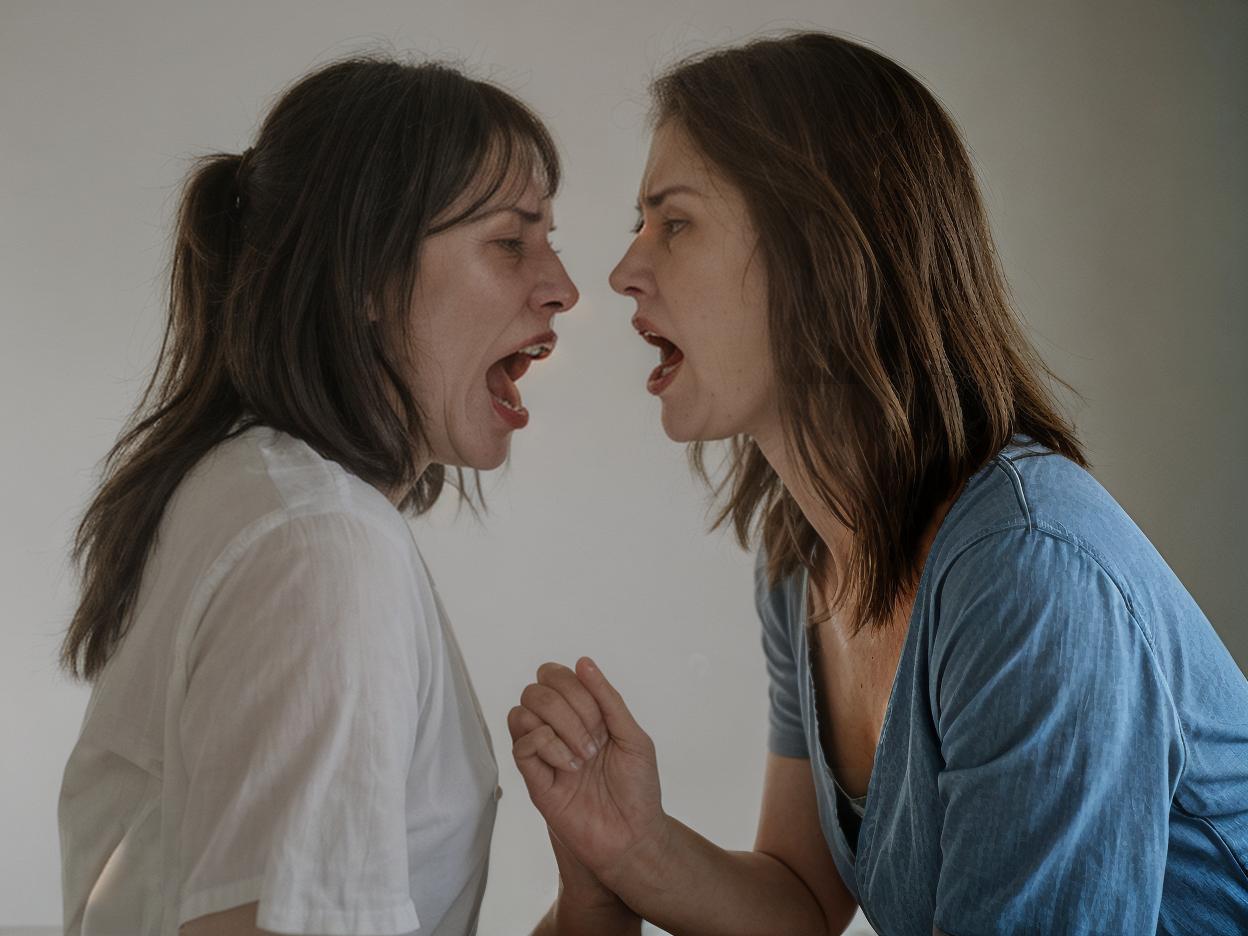  photorealistic image of a middle aged woman screaming at a 20 year old woman. 20 year old woman is sad and quiet. They are looking at each other.