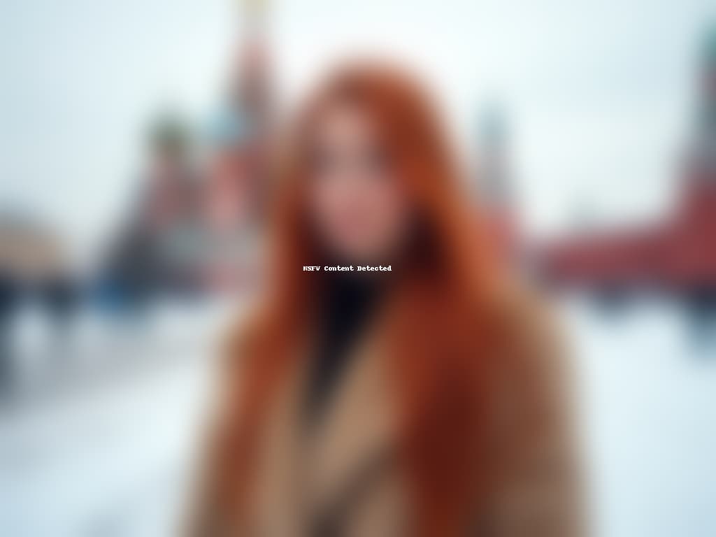  a woman with long red hair, wearing a fur coat, standing outdoors in snowy red square, moscow, with iconic colorful domes in the background. she faces slightly sideways, looking directly at the camera with a calm expression.