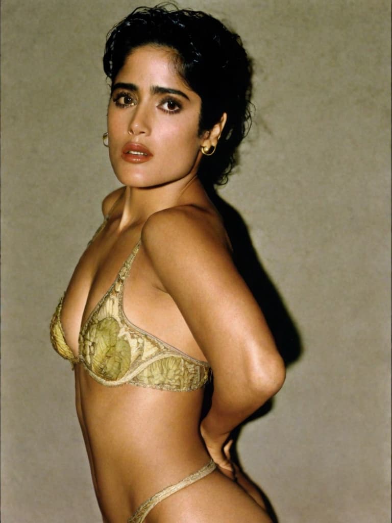  A young Selma Hayek, no clothes, posing in various sensual positions