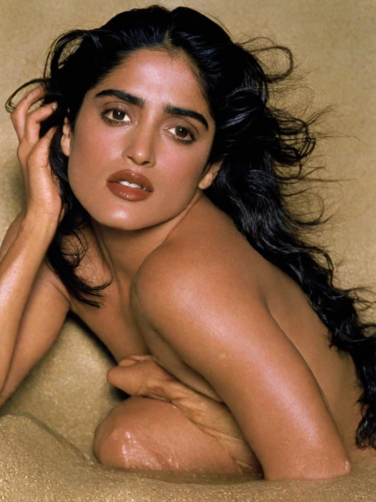  A young Selma Hayek, no clothes, posing in various sensual positions