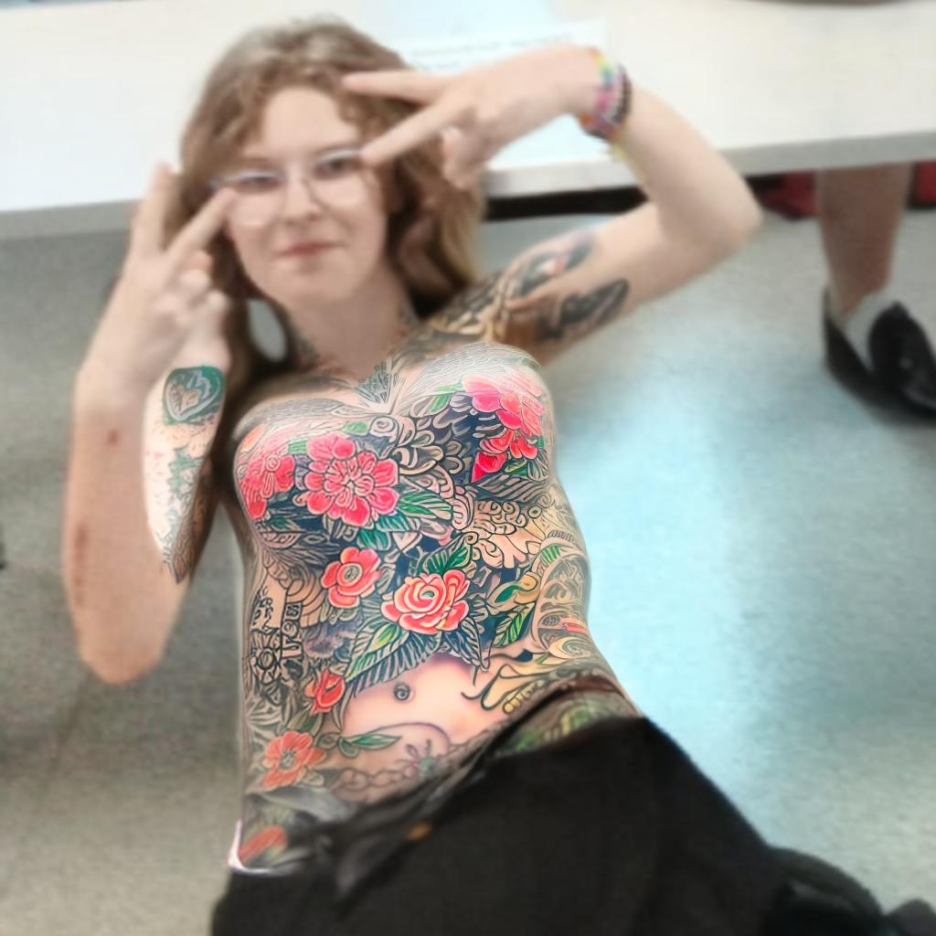  woman tattooedgirl, <lora:tattooed girl lora:1.0>, hyperrealistic <lora:detail tweaker lora:1.0>, (detailed skin), highly detailed, epicrealism