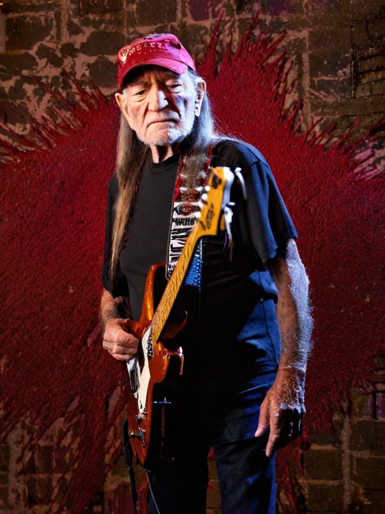  Singer Willie Nelson, medium shot, upper body, spotlight, long exposure lighting, street art style spray paint, glamour lighting